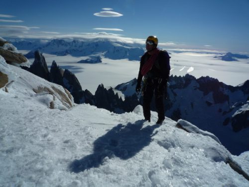Rolo nearing the summit of Fitz Roy with the Torres and the icecap behind. Our third time summiting Fitz Roy together in tennis shoes (not necessarily reccommended!)